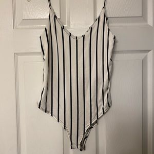 Black and white stripe body suit